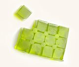Cubes of green jelly, on a white background