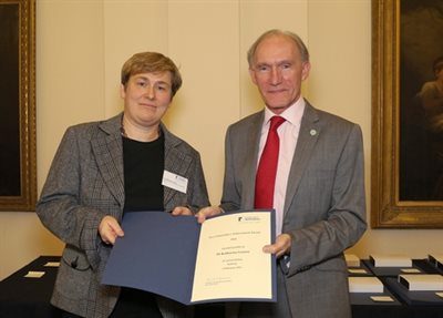 Dr Katharina Lorenz being presented with her award
