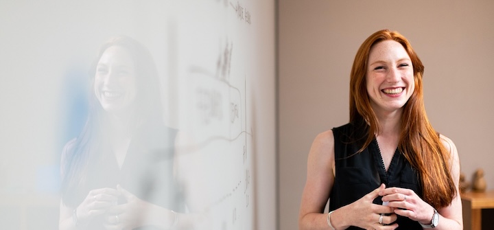 Woman presenting in a teaching room