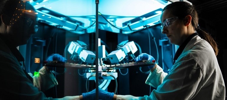 Technician operating the X-Ray Diffraction machine