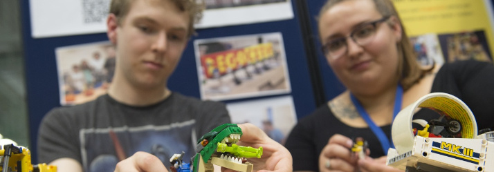 Undergraduate students playing with Lego header