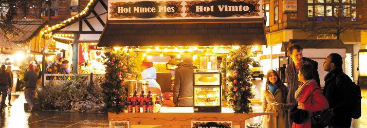 Undergraduate and postgraduate students visiting the Christmas Market, City Centre 714x249