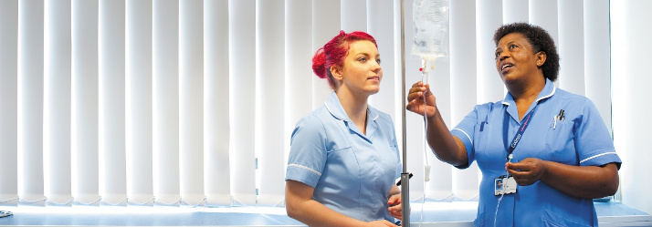 Female postgraduate student is learning how to check IV fluids, QMC 714x249