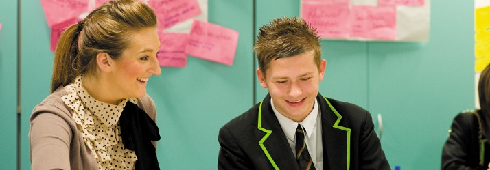 Female postgraduate student teaching pupils, Nottingham University Samworth Academy (NUSA) 714x249