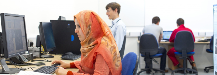 Female postgraduate working in the Hounsfield Facility, Sutton Bonington 714x249