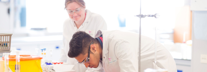 Researchers at an RB R&D facility 714x249