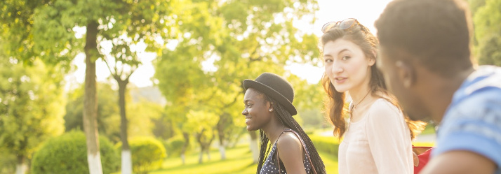 Students walking around the Ningbo Campus 714x249