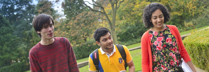 Undergraduate students relaxing in in the Millennium Garden, University Park 714x249