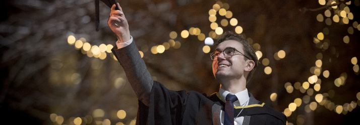 Undergraduate student outside The Orchard Hotel - Winter Graduation 2017, University Park 714x249