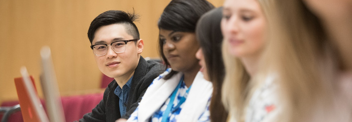 Undergraduate students in a lecture, Keighton Auditorium, University Park 714x249