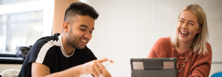 Undergraduate students studying in George Green library, University Park 714x249