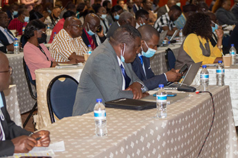 Male and female delegates at a conference in Zimbabwe