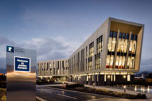 The Advanced Manufacturing Building on Jubilee Campus at night.
