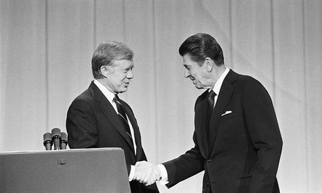 Carter and Reagan shake hands