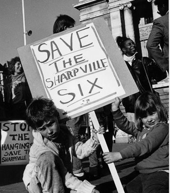 Young supporters with a 'Save the Sharpville Six' sign, John Birdsall