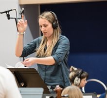 female-student-conducting-recording