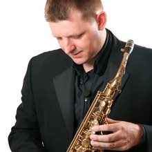 Alistair Parnell with a saxophone