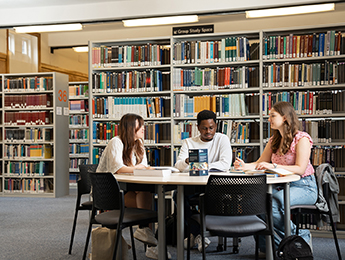 Study space with students at James Cameron-Gifford Library