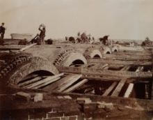 Black and white photograph of waterworks under construction