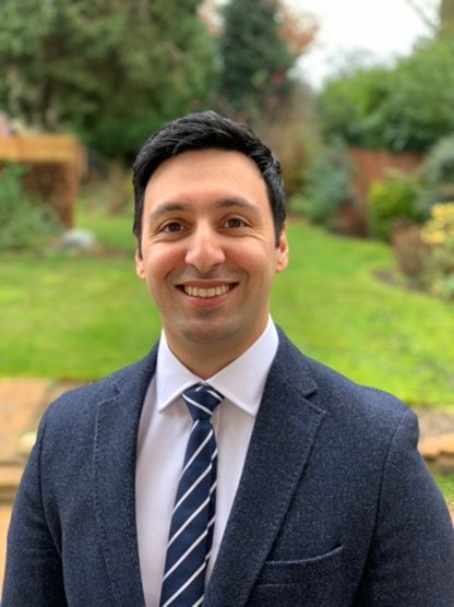 Head and shoulders portrait of Adeel Ikram