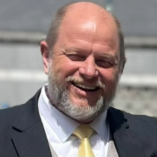 Head and shoulders portrait of Alan Norrish