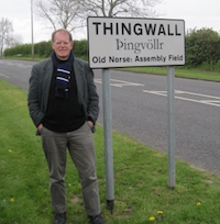 Stephan Harding next to Thingwall sign
