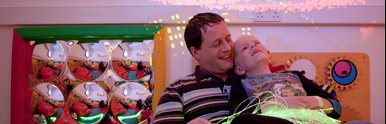 Young patient and their parent at the Children's Brain Tumour Research Centre