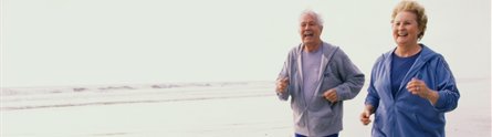 Two older people exercising