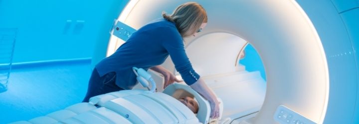 What is medical physics? Member of staff using MRI scanner