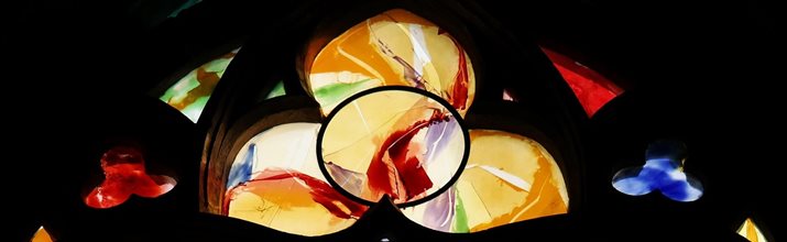 Depiction of the holy trinity knot in stained glass window