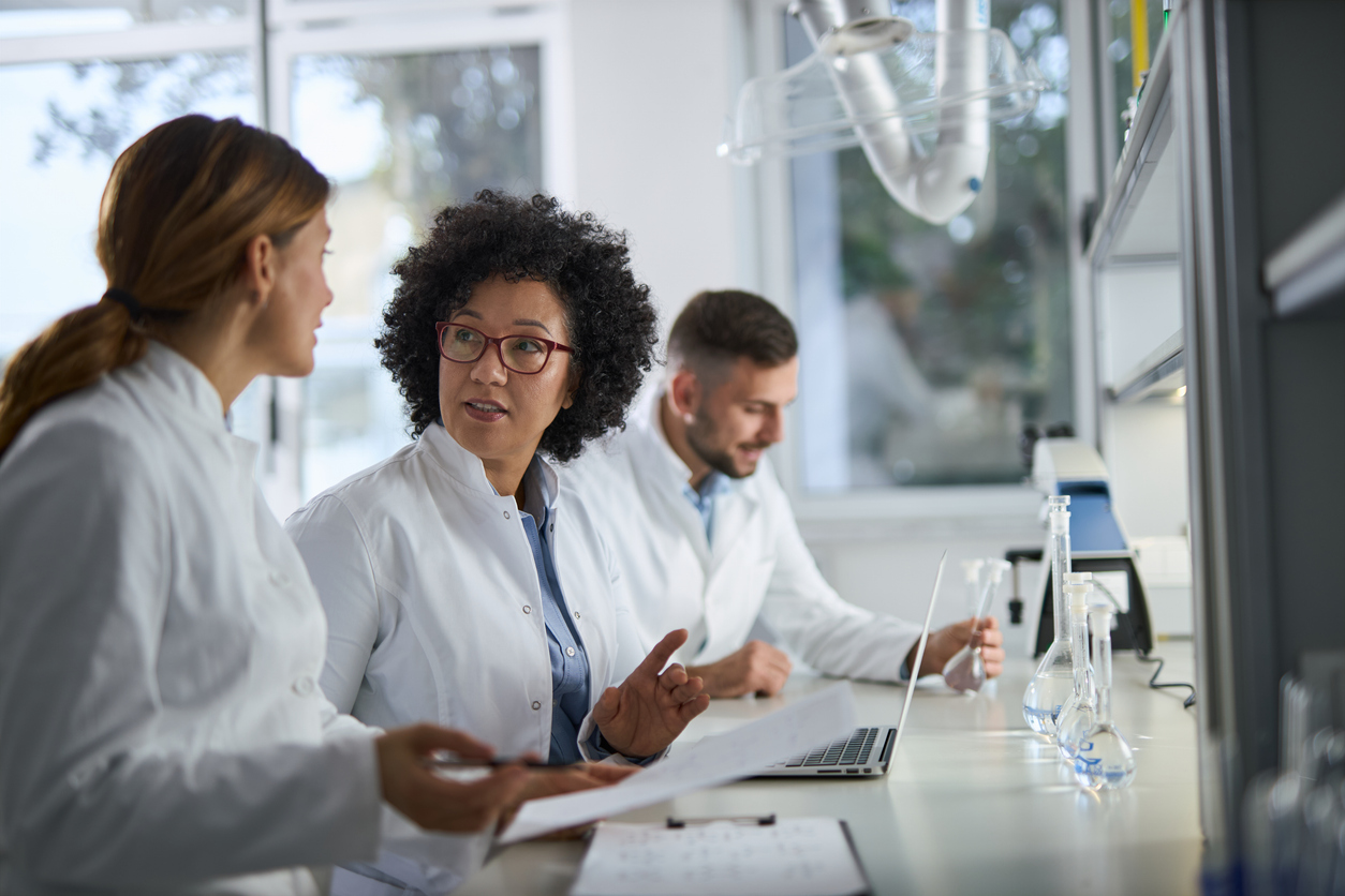 Researchers collaborating in a laboratory