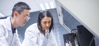 Staff and students working in the lab