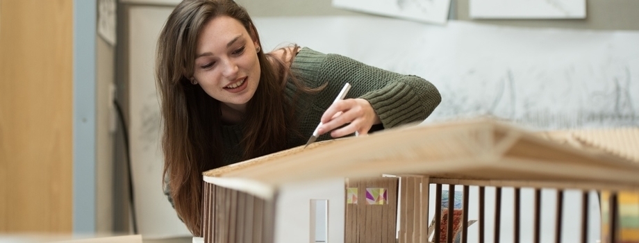 Student woring in the design studio