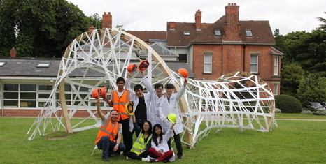 The team of students involved in the construction workshop