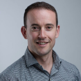 Head and shoulders portrait of Dr Mathew Piasecki