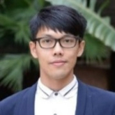 Head and shoulders portrait of Dr Vic Sun