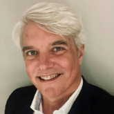 Head and shoulders portrait of Jon Lund