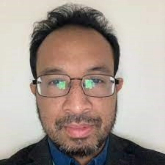 Headshot of Professor Iskandar Idris