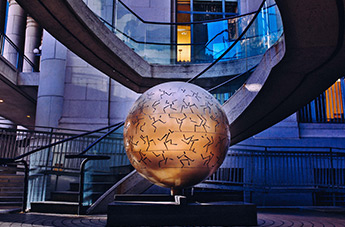 globe in front of staircase