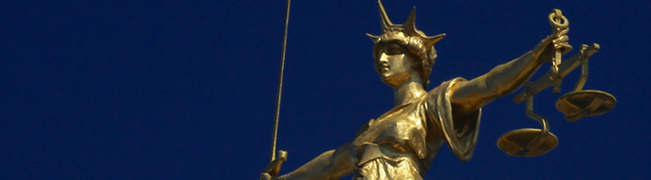 gold scales of justice statue