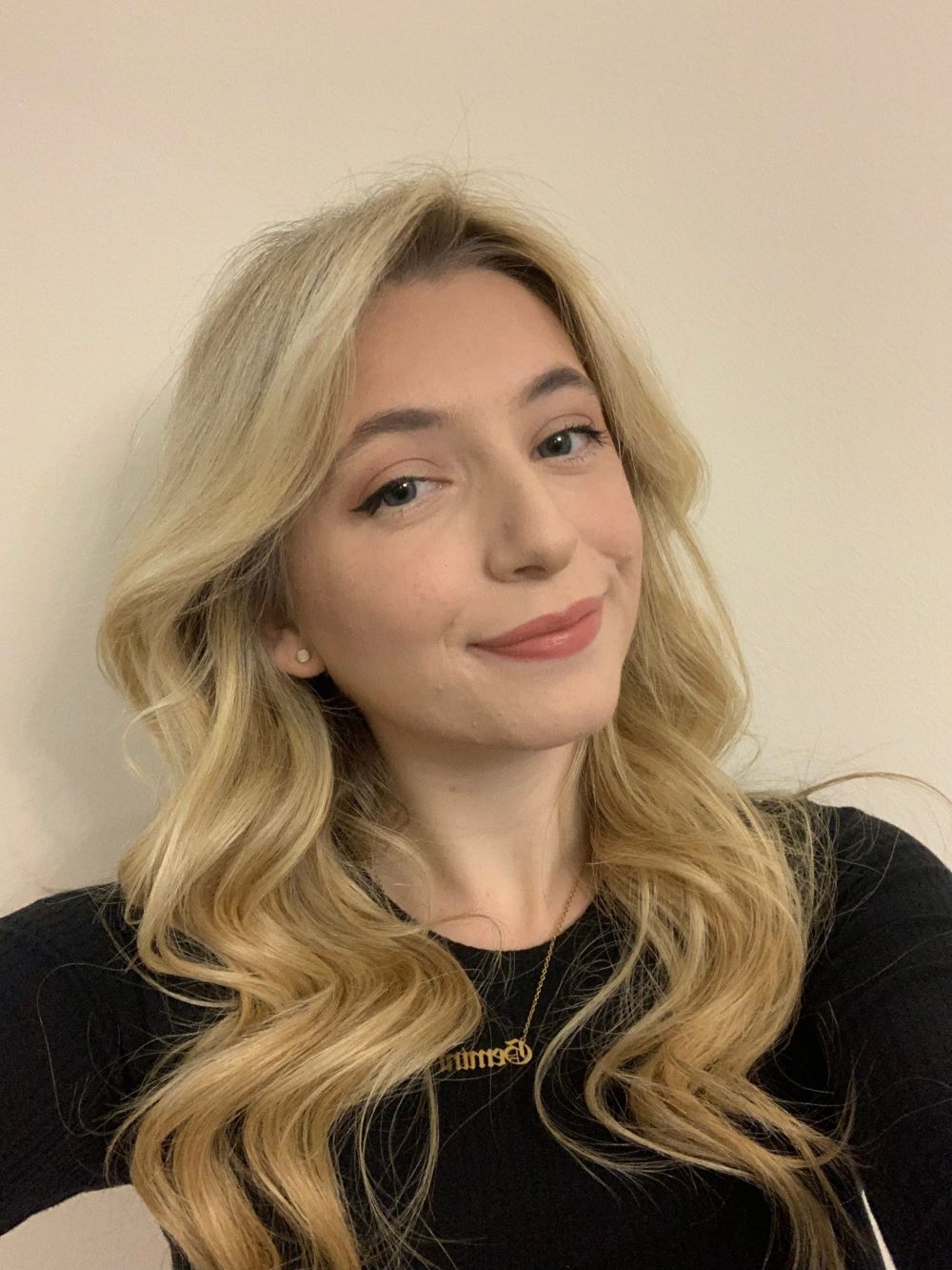 Head and shoulders portrait of Aicia Peters smiling