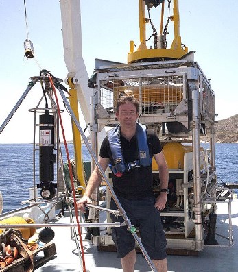 Jon Henderson with sonar testing equipment