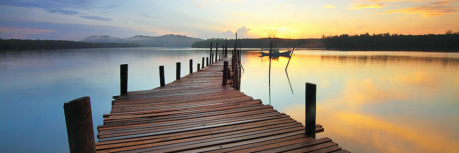 Male and female student walking on campus