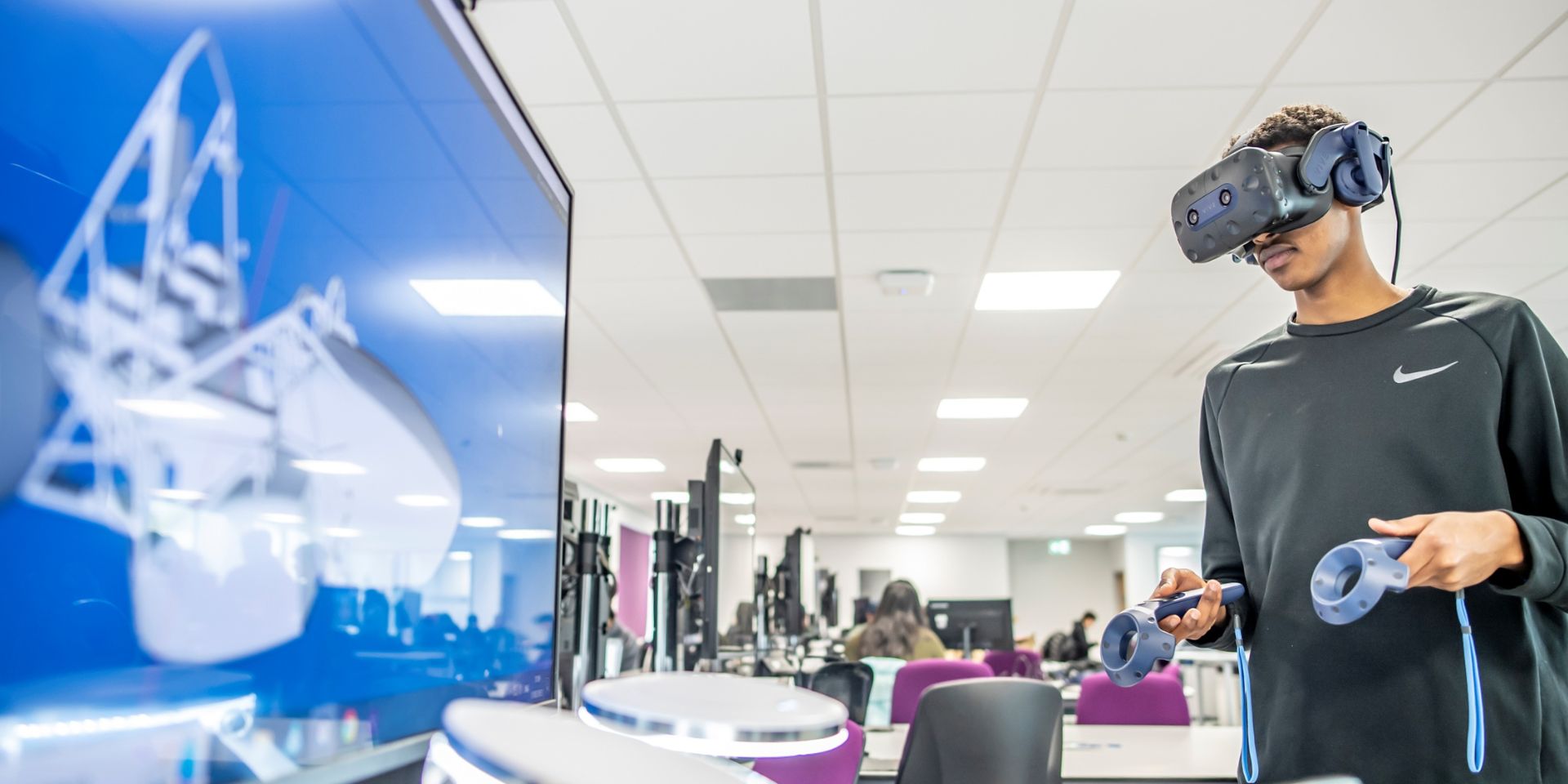 Undergraduate student using a VR headset