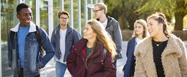 Group of undergraduates walk on University Park Campus