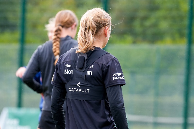Football player wears Catapult GPS tracker vest