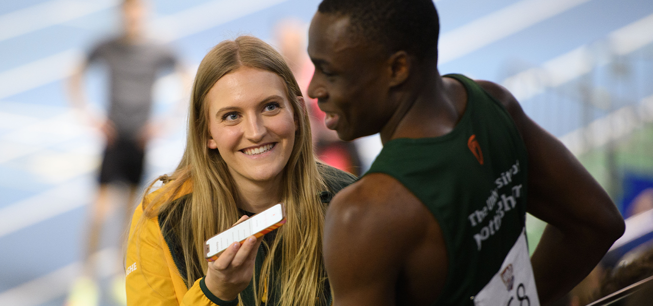 UoN Sport Brand Ambassador interviewing athlete after race