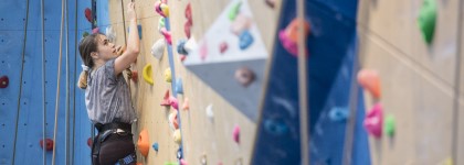 Female student climbing at David Ross Sports Village