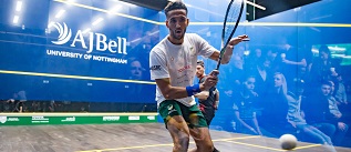 Declan James on court playing in the Premier Squash League for the University