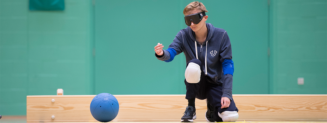 Male student playing Goalball at David Ross Sports Village